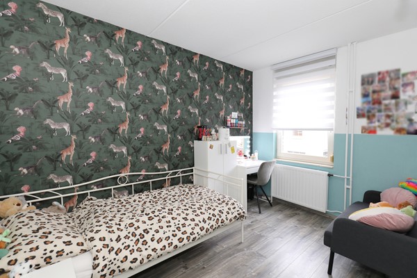 Foto - Te koop: Een goed geïsoleerde tussenwoning met onder meer een zonnige tuin op het zuiden, 3 slaapkamers, fijne badkamer, grote zolder(slaap)kamer, rustige tuin en een garage in Voerendaal.(Kunrade)